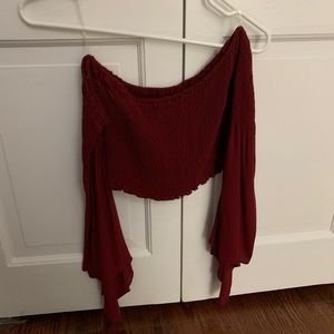 maroon off the shoulder bell sleeved cropped shirt